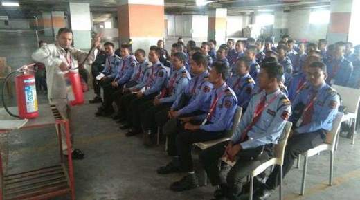 Seated cohort at a site briefing