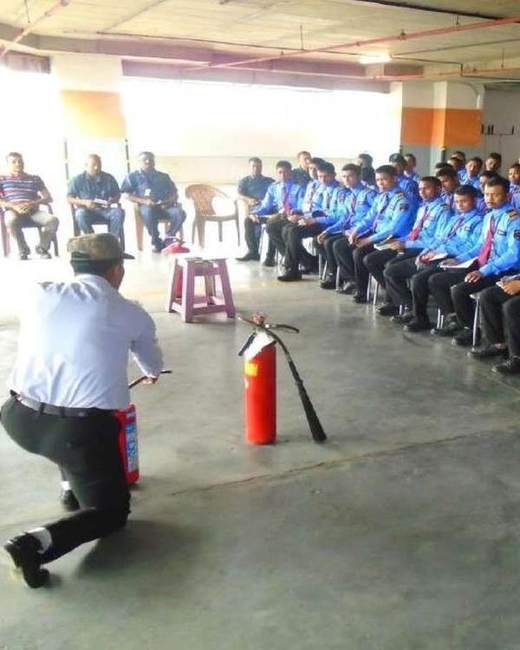 Extinguisher demonstration to assembled guards